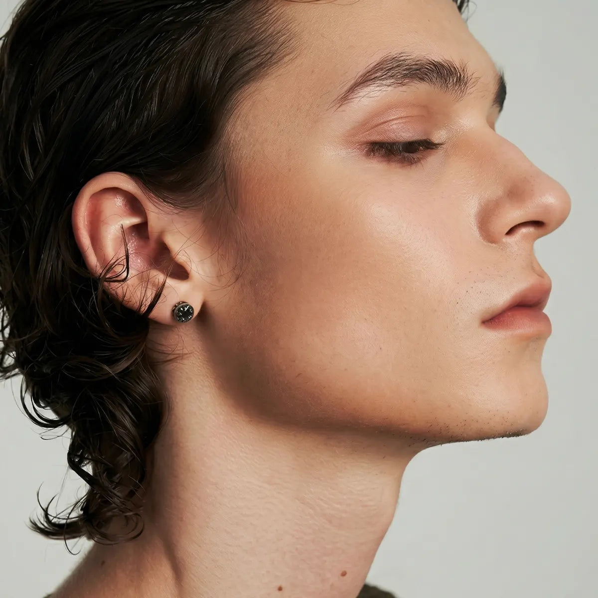 Lifestyle shot of man wearing Roman Numeral CZ Star Studs