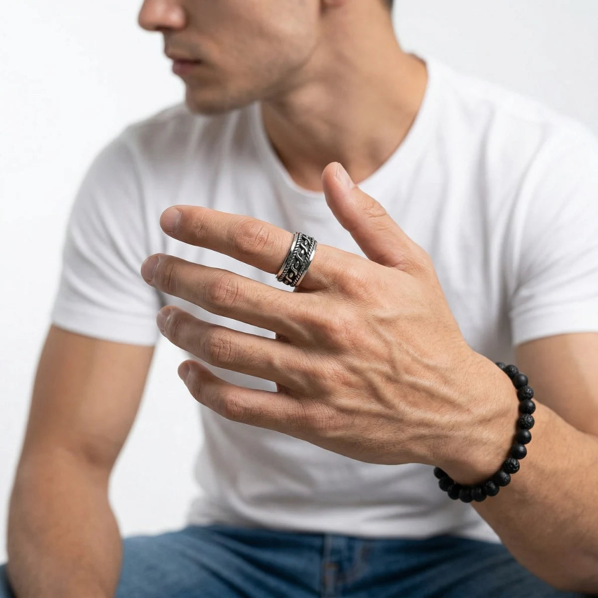 Lifestyle shot of man wearing silver Men‘s Knot Ring