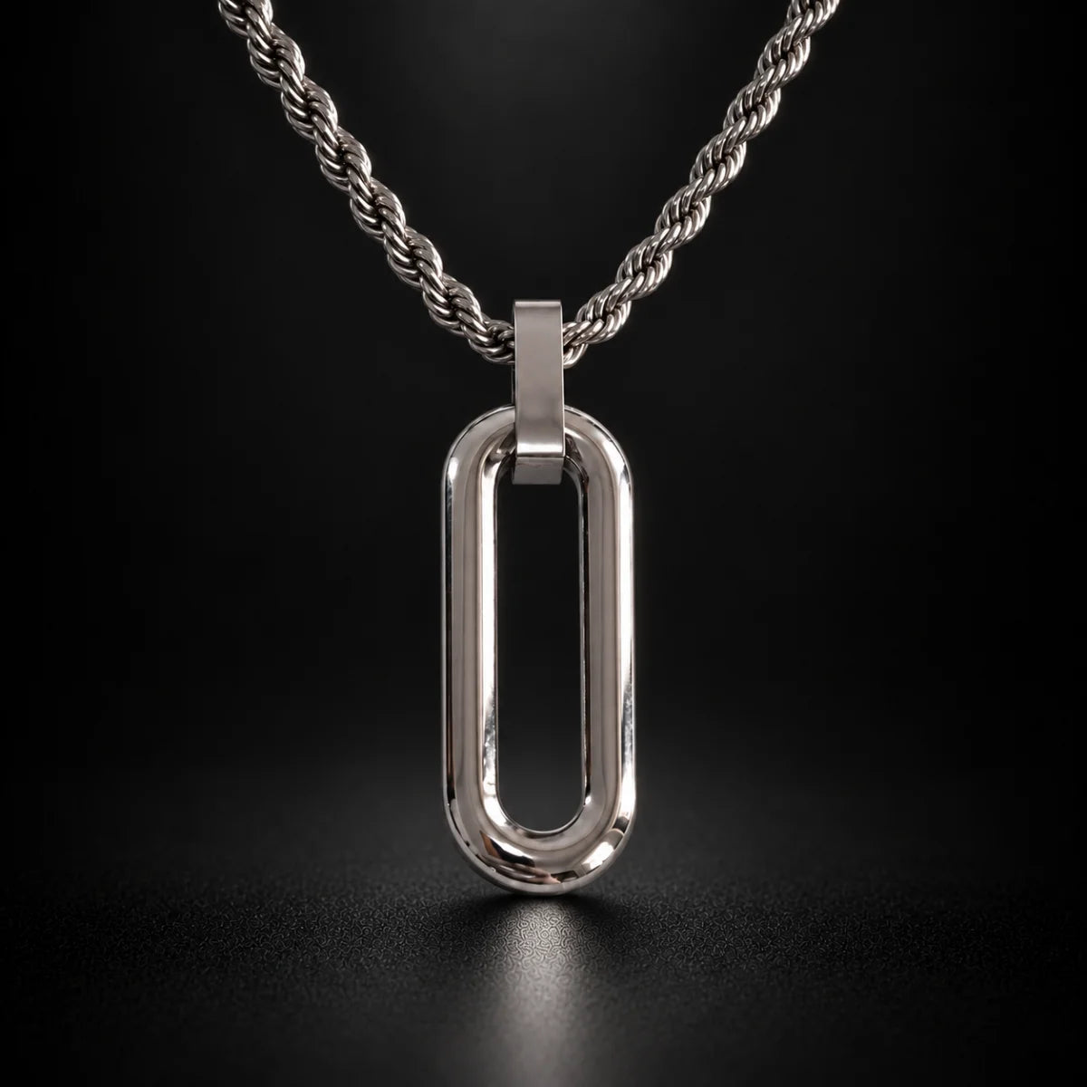 long open rectangle necklace black background hero