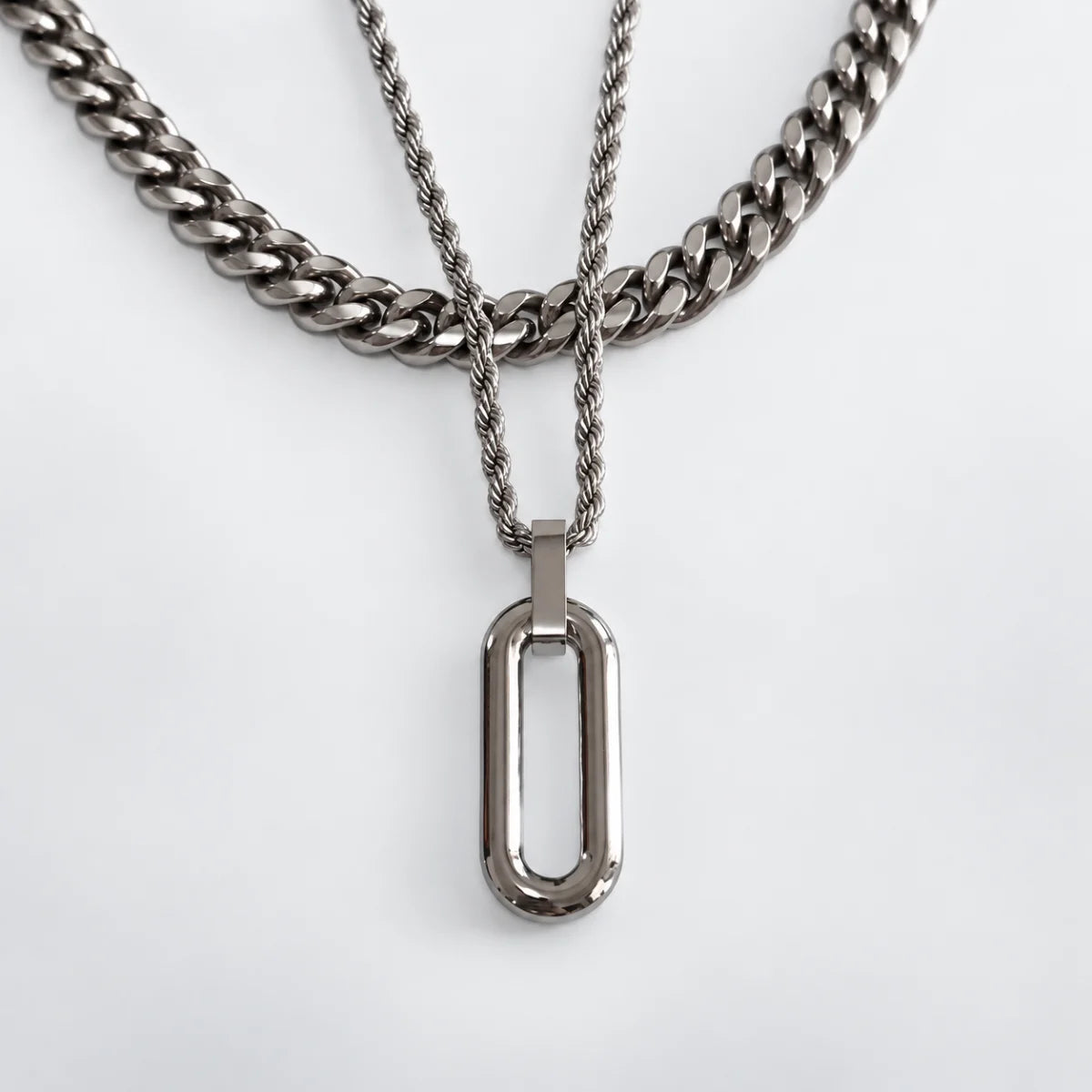 long open rectangle necklace layered set white background