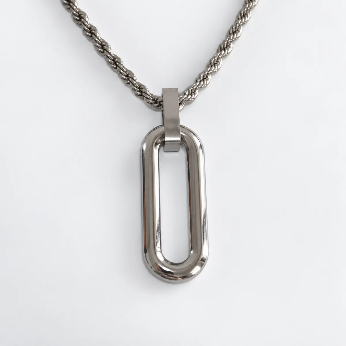 long open rectangle necklace with rope chain white background