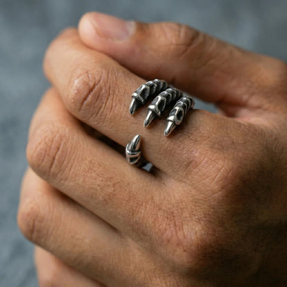 Man wearing silver Dragon Claw Ring talon cluster