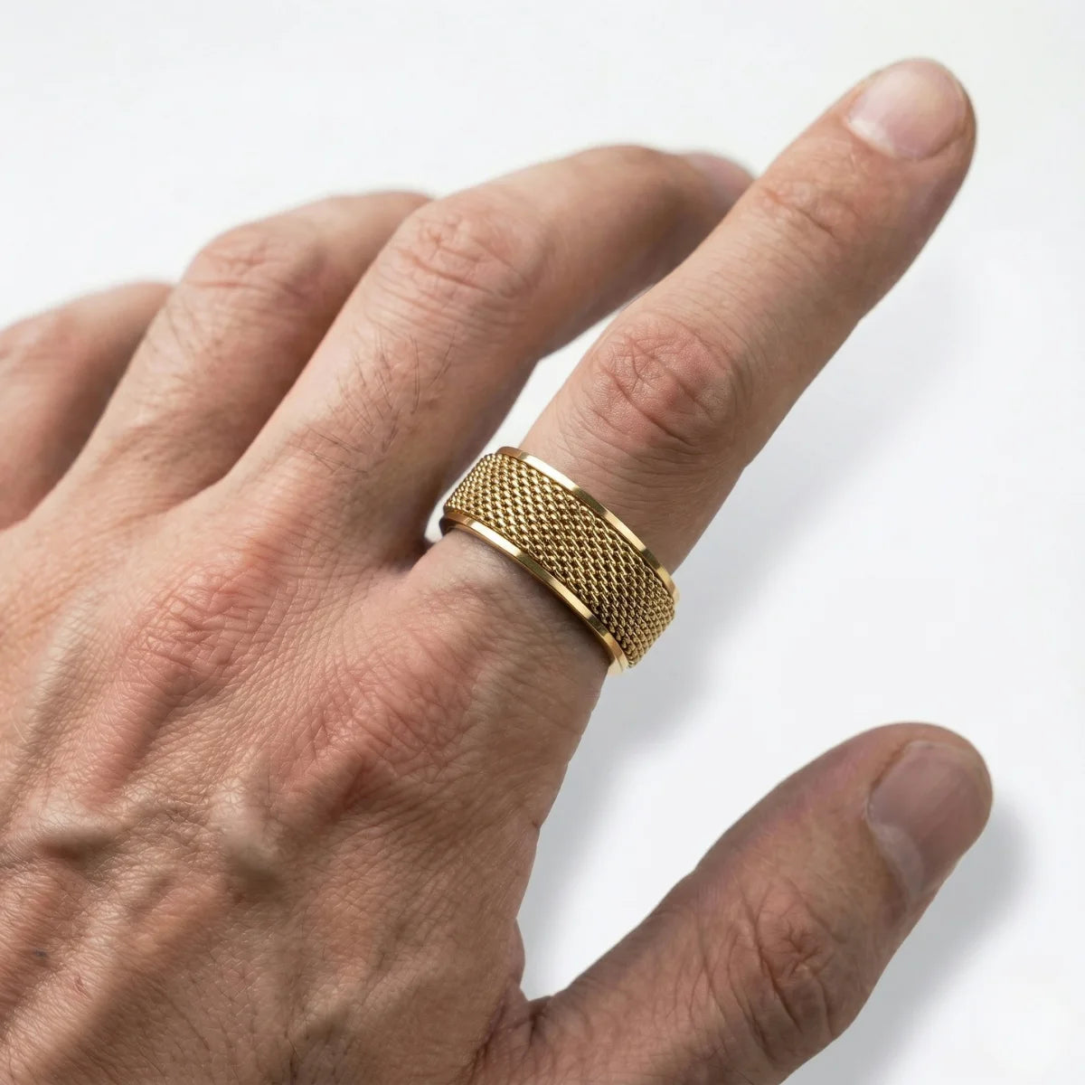 Men's 8mm Gold Mesh Fidget Ring on Index Finger