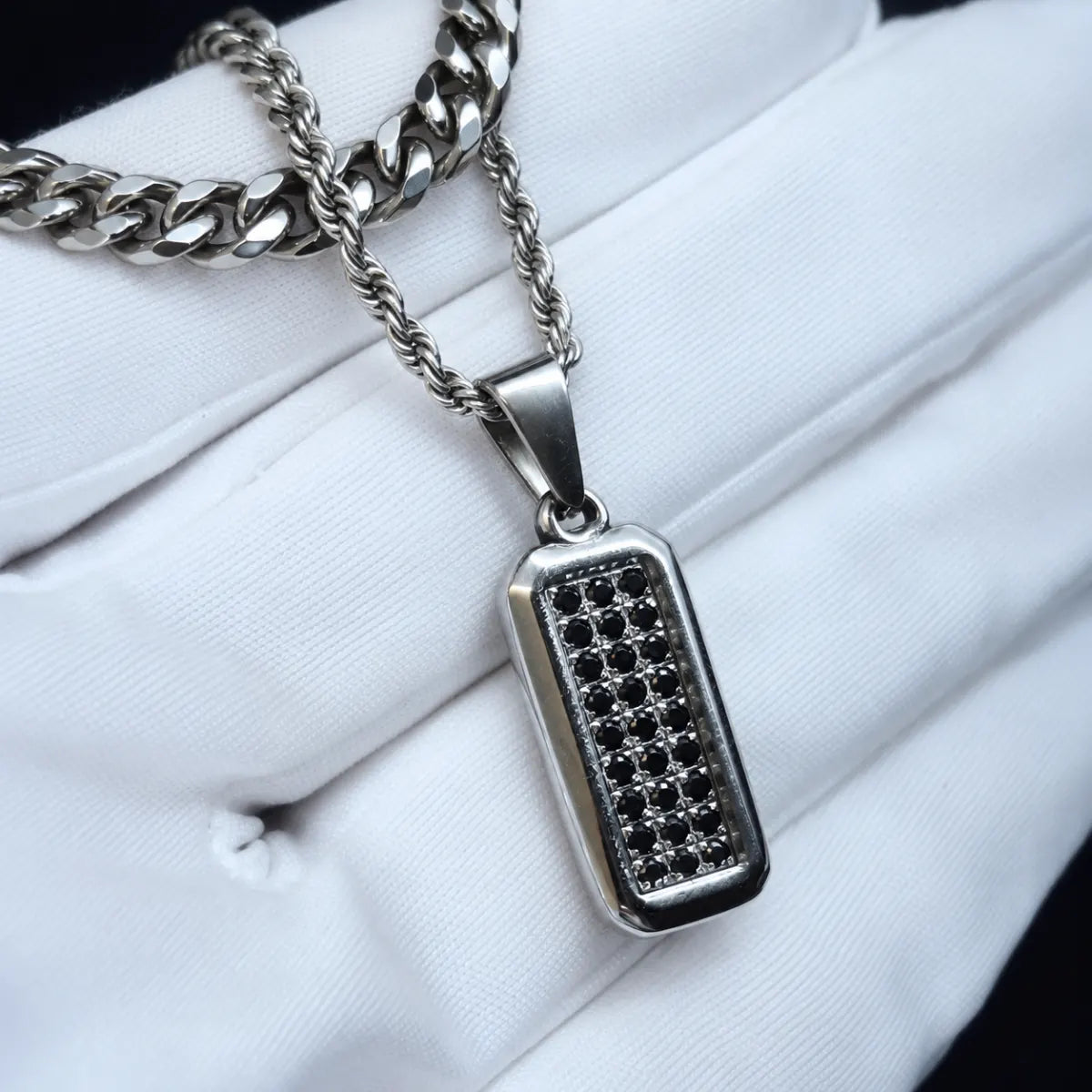 men’s black cz dog tag necklace layered set lifestyle white shirt