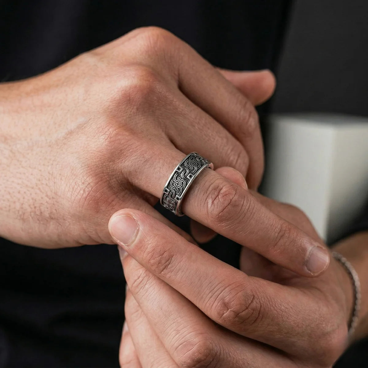 Men‘s silver Greek Key Ring on finger