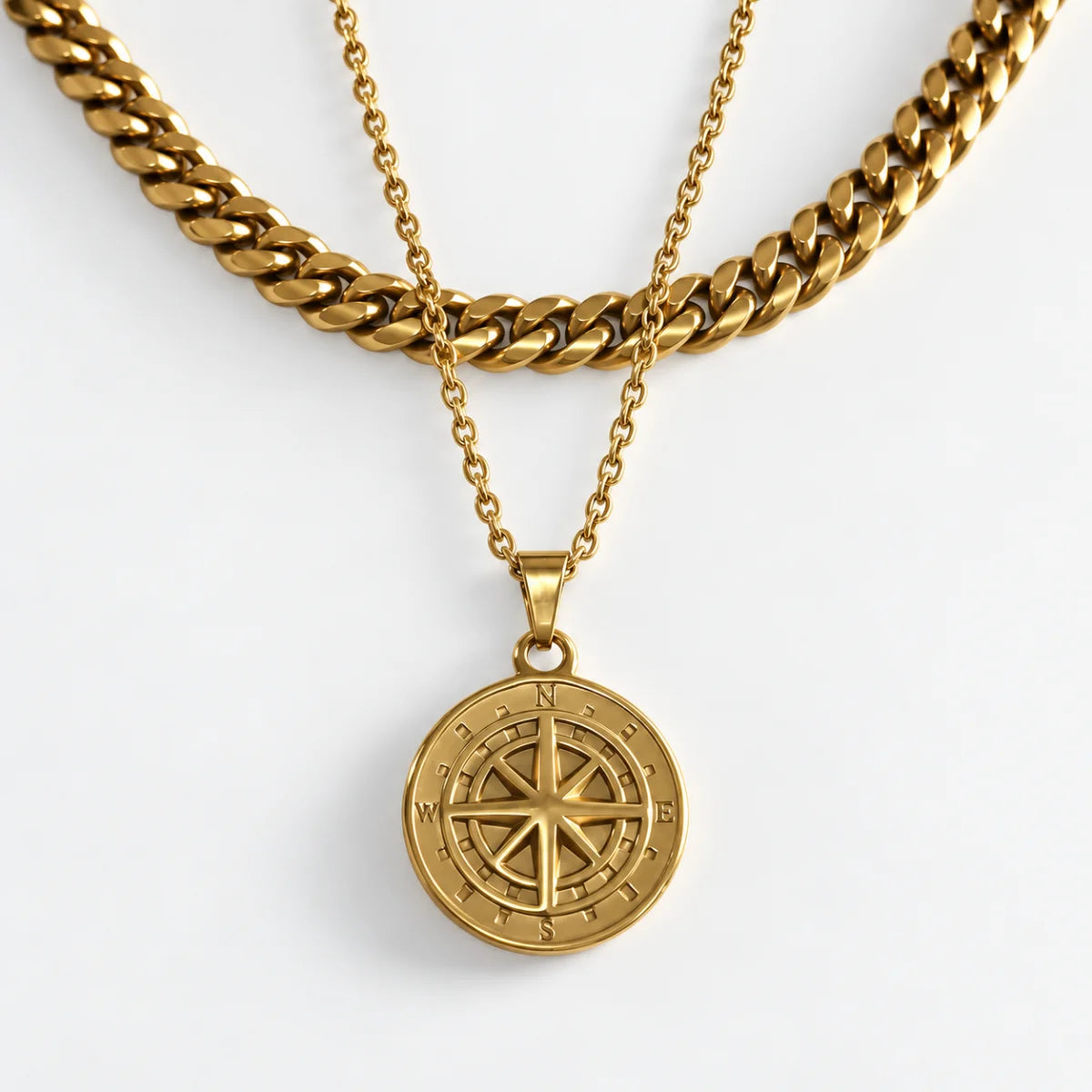minimalist compass pendant necklace gold layered set white background