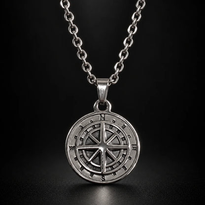 minimalist compass pendant necklace silver black background hero