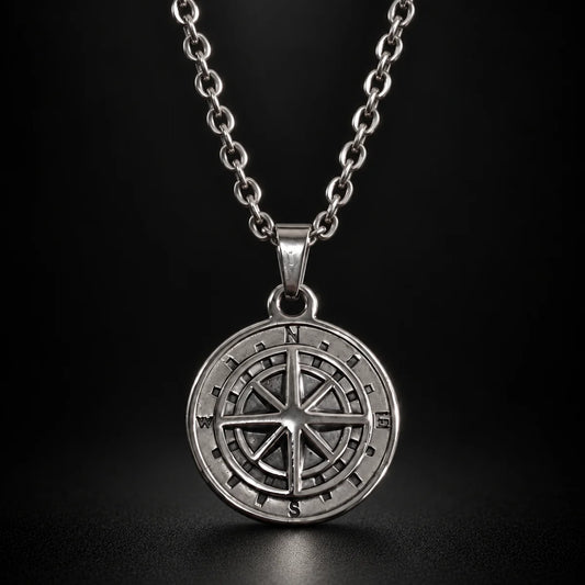 minimalist compass pendant necklace silver black background hero