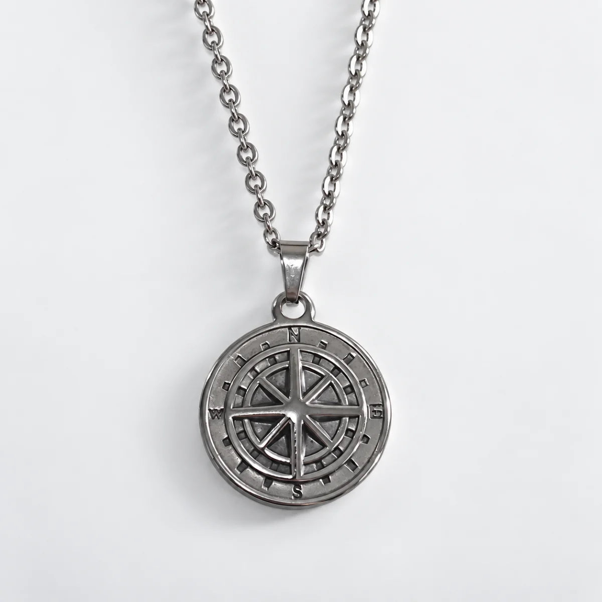 minimalist compass pendant necklace silver with o chain white background