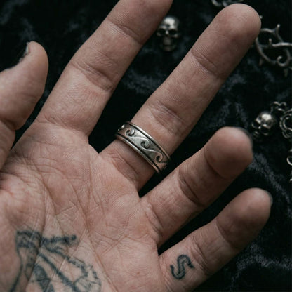 Open Hand Displaying Men‘s Wave Ring Alternative Mens Jewelry