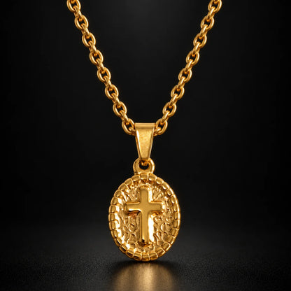 oval cross pendant necklace gold black background hero