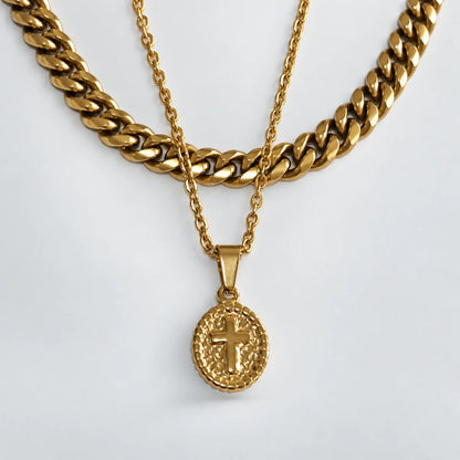 oval cross pendant necklace gold layered set white background