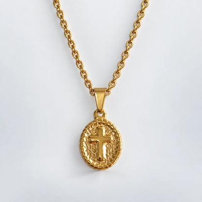 oval cross pendant necklace gold with o chain white background
