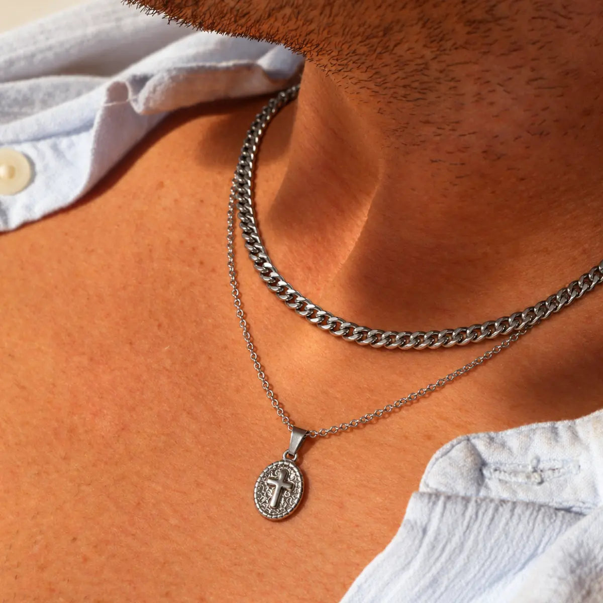 oval cross pendant necklace silver layered set lifestyle white shirt