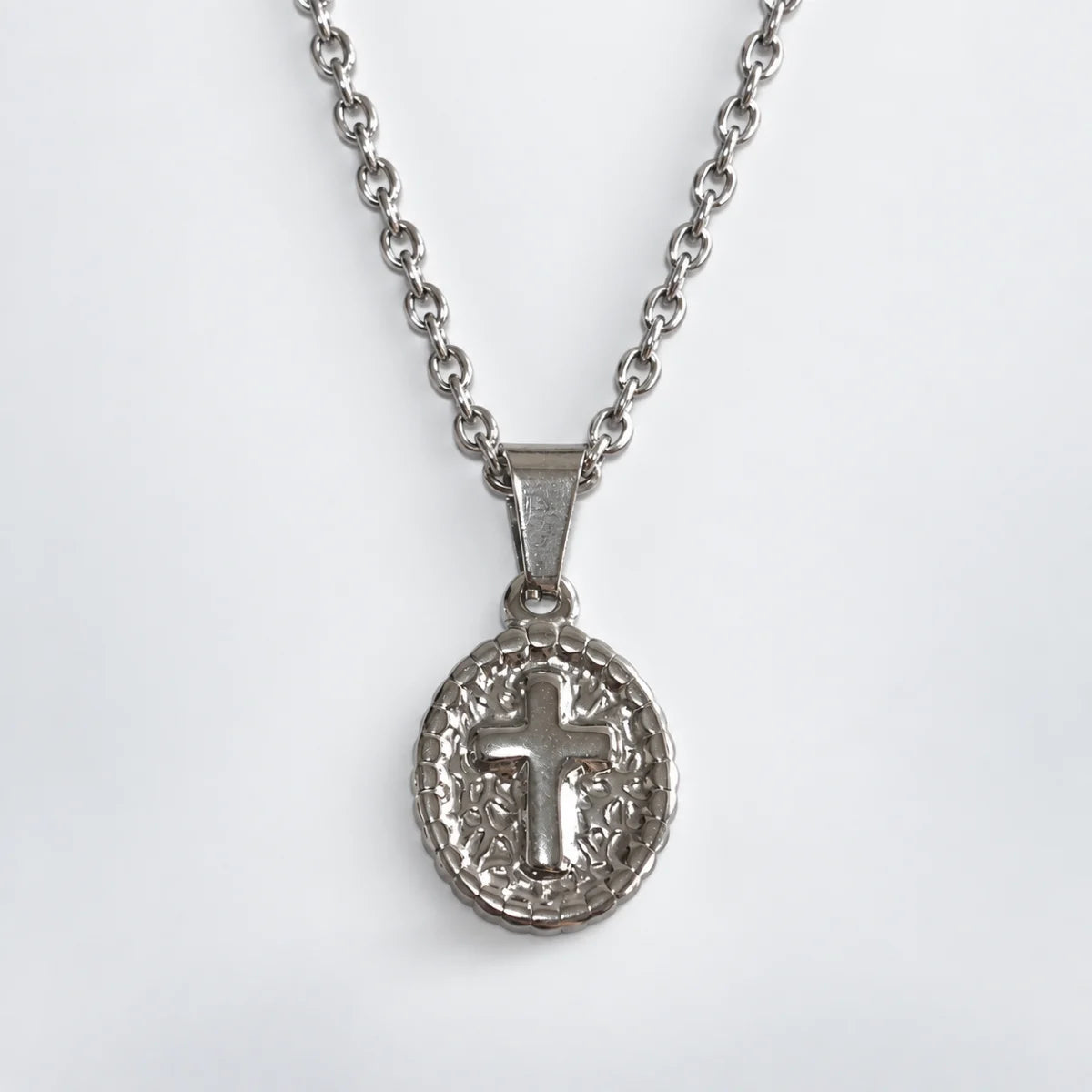 oval cross pendant necklace silver with o chain white background
