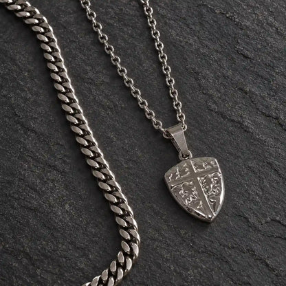 shield cross pendant necklace silver layered set birds eye display