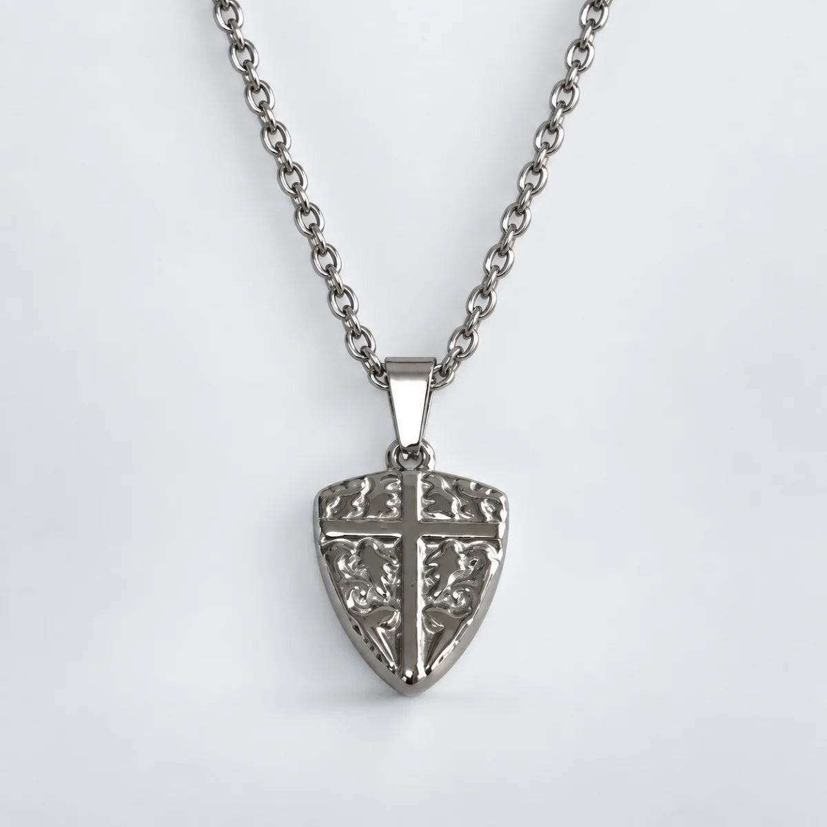 shield cross pendant necklace silver with o chain white background