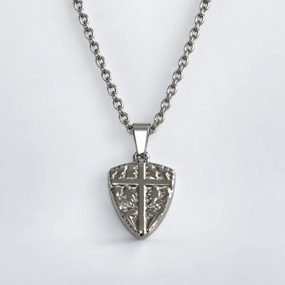 shield cross pendant necklace silver with o chain white background