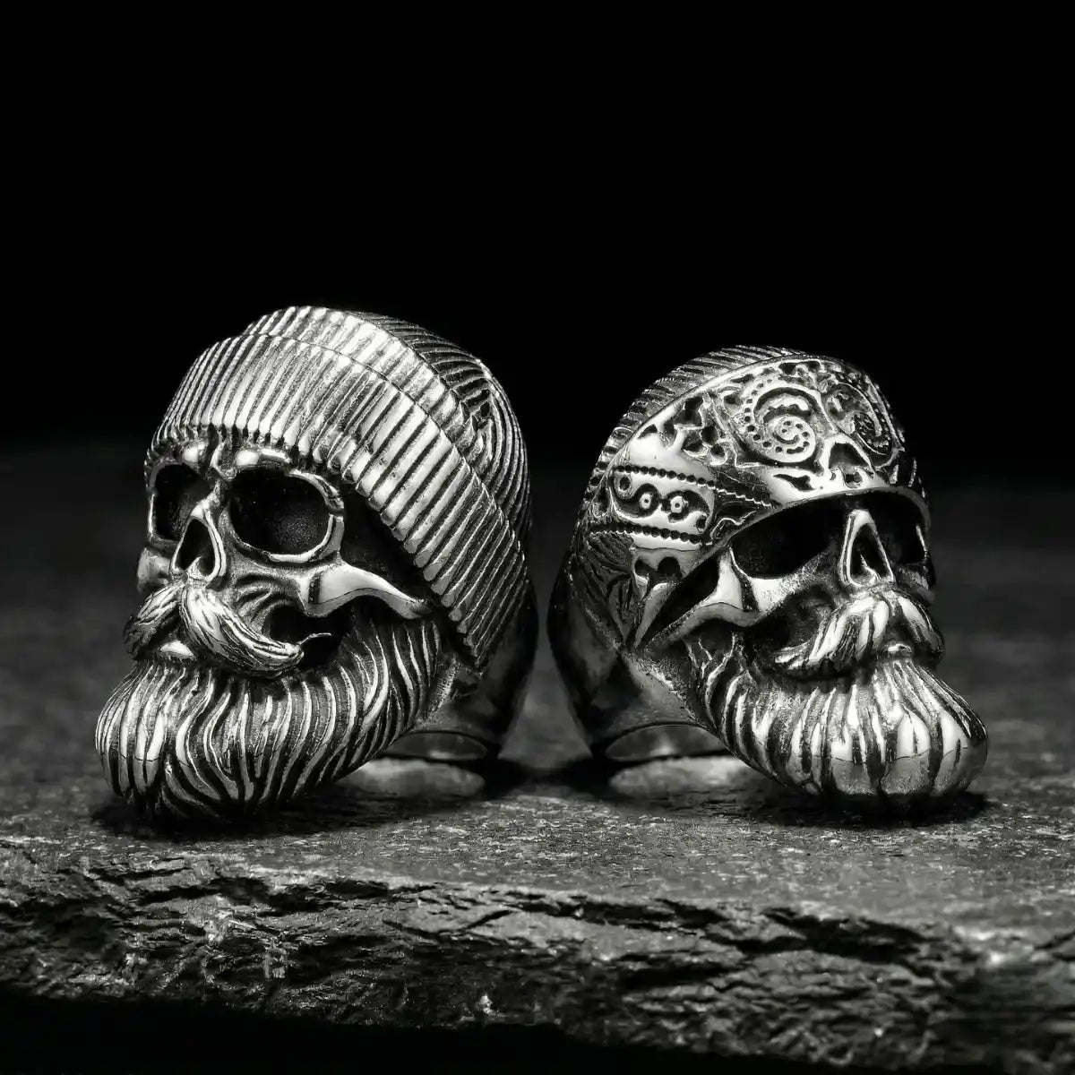 Silver Beard Skull Rings Style A and B on dark stone