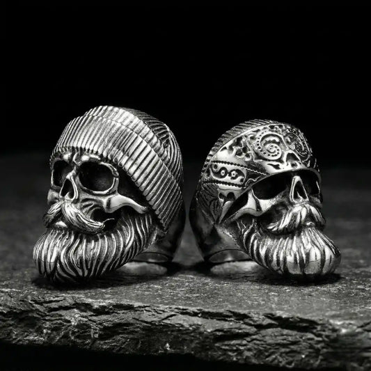 Silver Beard Skull Rings Style A and B on dark stone