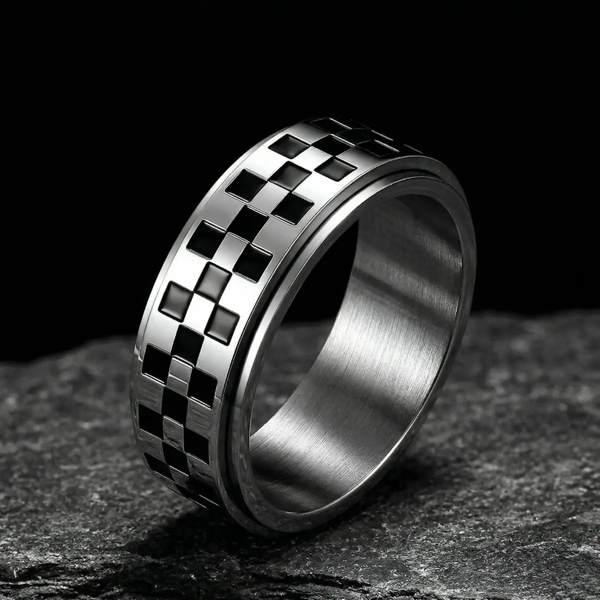 Silver Checkered Spinner Band on dark stone
