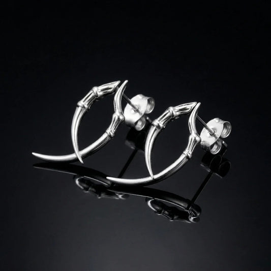 Silver Dragon Claw Stud Earrings on black background