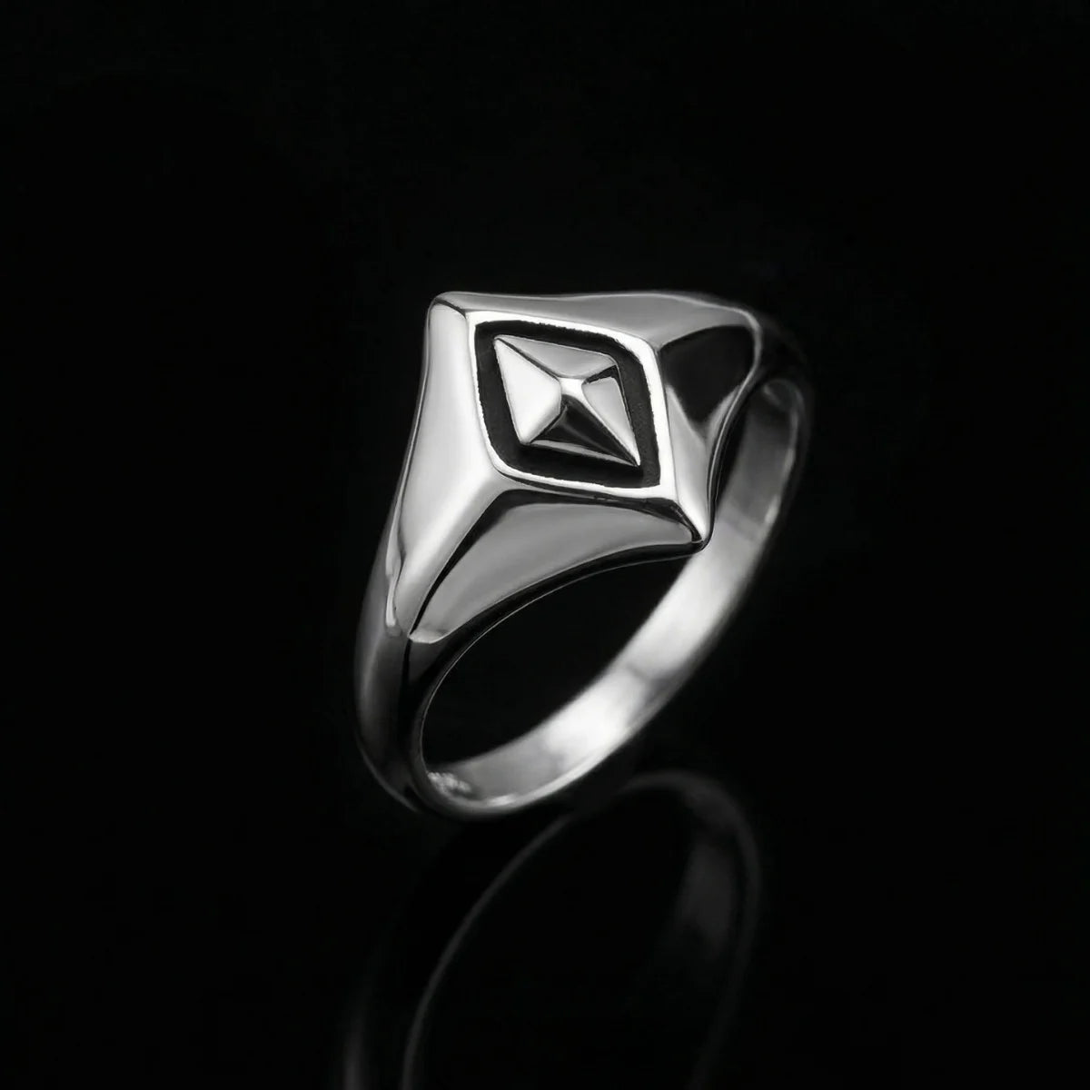 Silver Geometric Rhombus Ring on dark background
