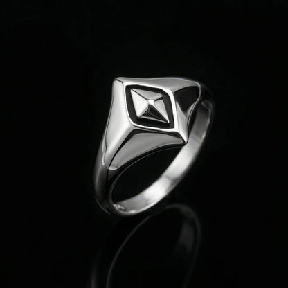 Silver Geometric Rhombus Ring on dark background