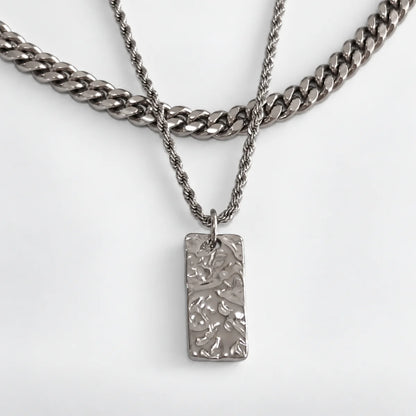 silver hammered rectangle necklace layered set white background