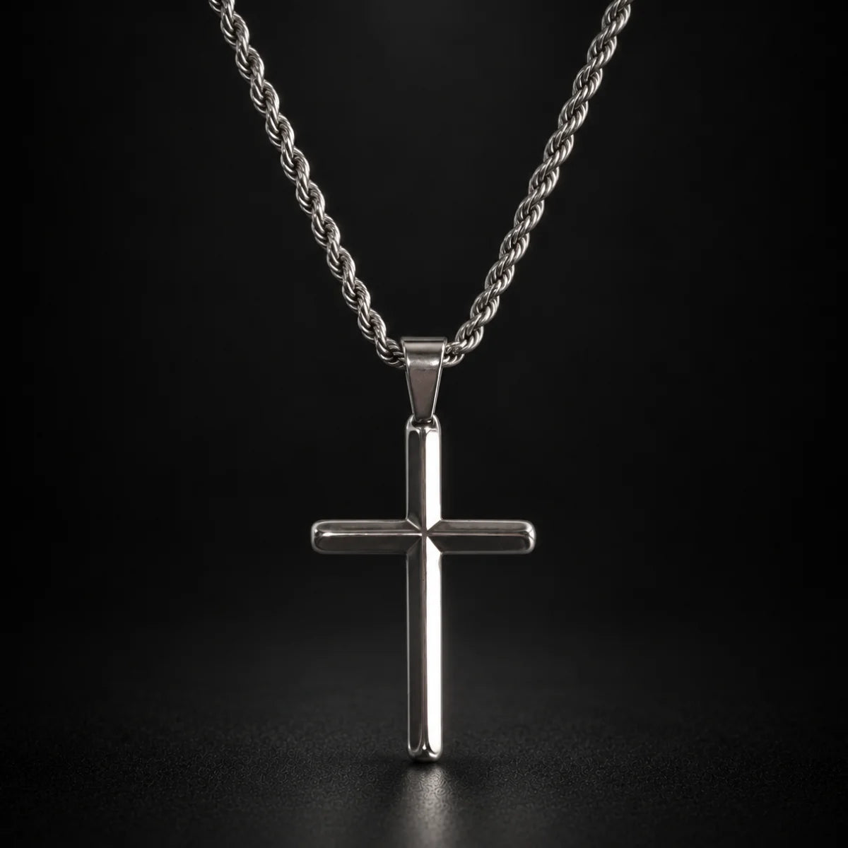 silver minimalist cross necklace black background hero