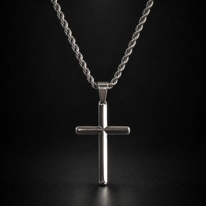 silver minimalist cross necklace black background hero