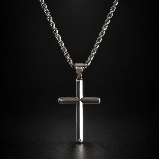 silver minimalist cross necklace black background hero