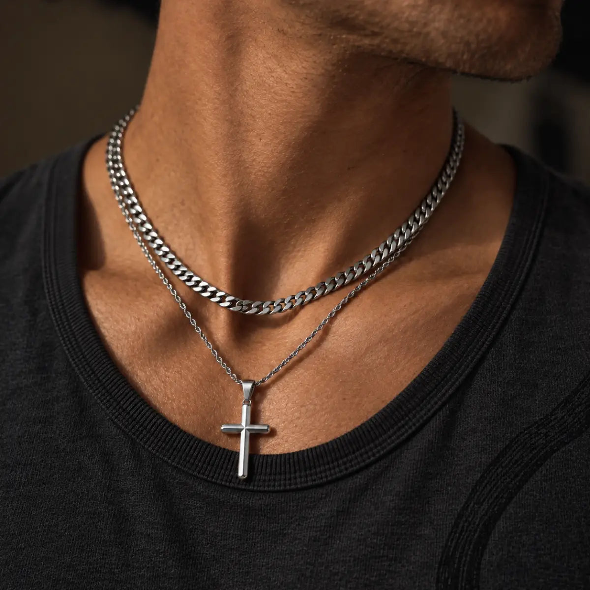 silver minimalist cross necklace layered set on model