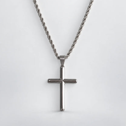 silver minimalist cross necklace with rope chain white background