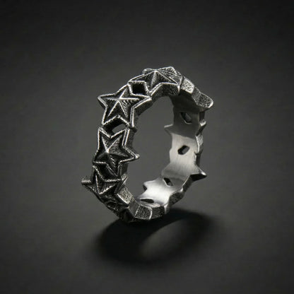 Silver Punk Star Ring reflective on black background