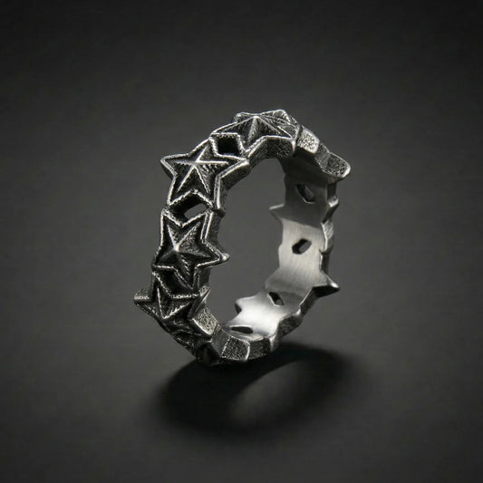 Silver Punk Star Ring reflective on black background