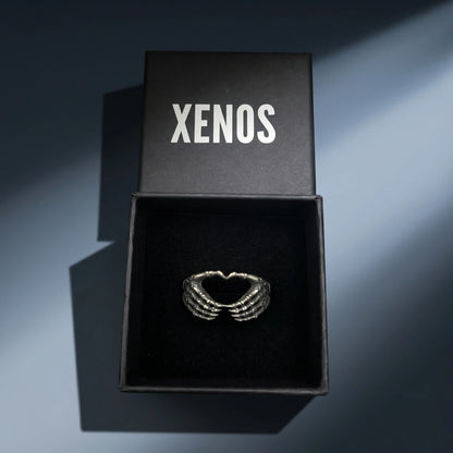 Skeleton hand heart ring Presented in Xenos Jewelry Packaging Box
