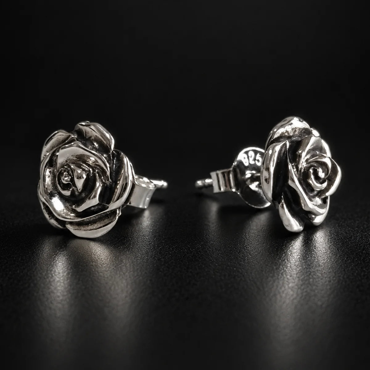 Sterling Silver Rose Stud Earrings Black Background