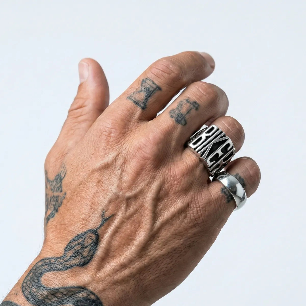 Tattooed Hand Displaying Biker Letter Ring Snake Tattoo Punk Accessories