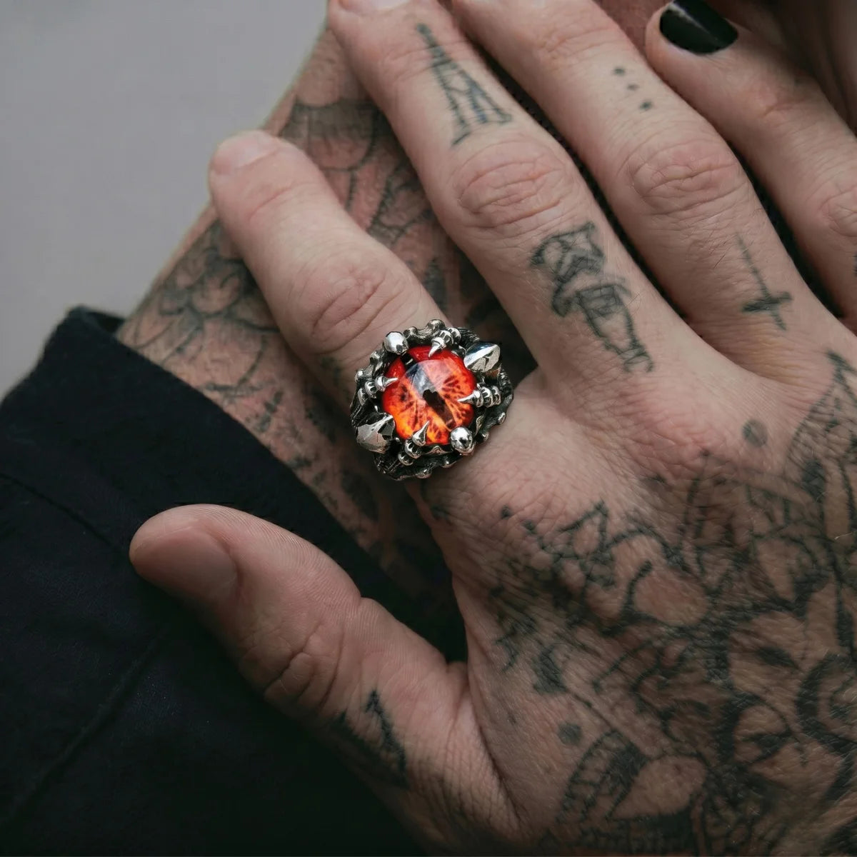 Tattooed Hand Wearing Dragon Eye Ring Red Eye Alternative Biker Accessories