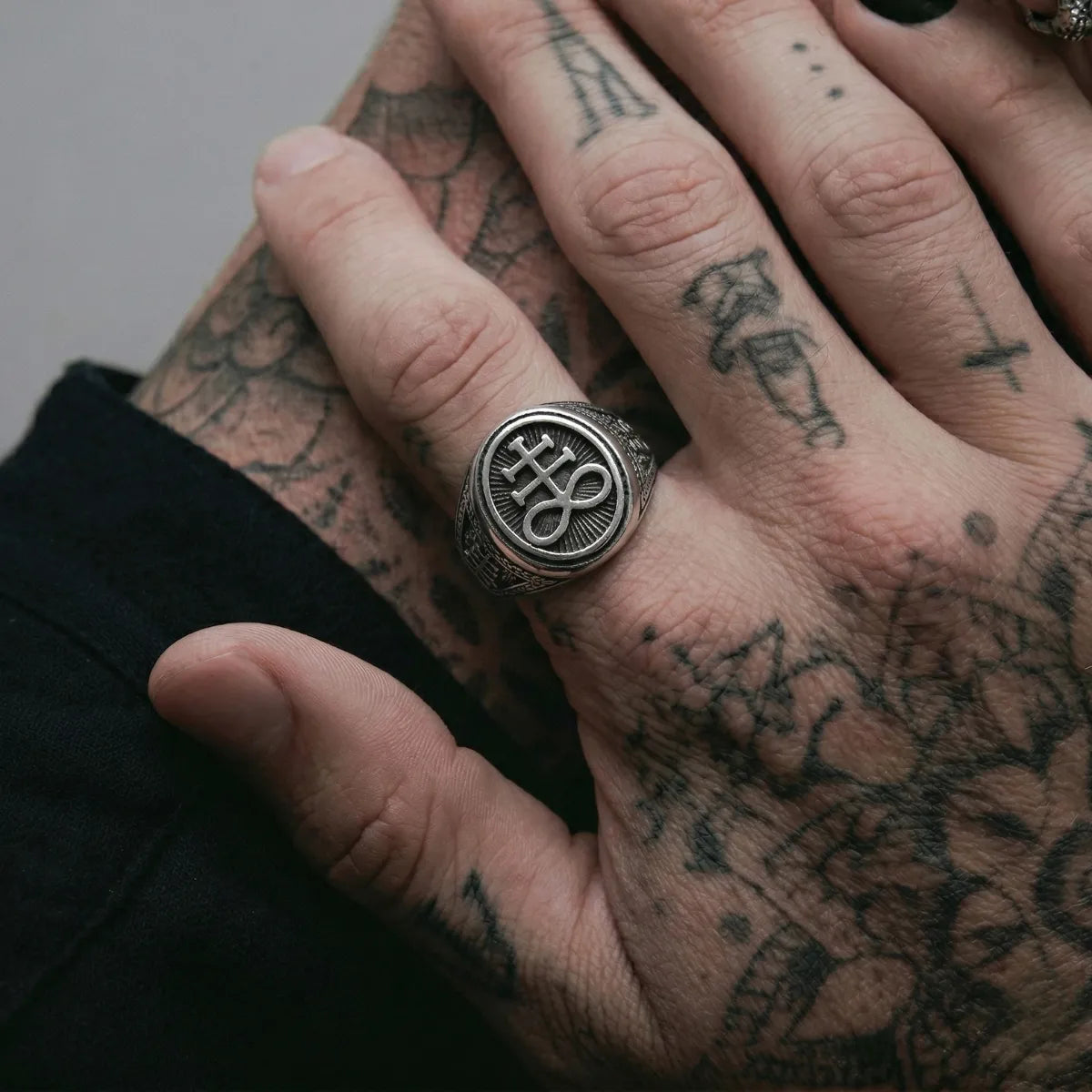 Tattooed Hands Wearing Leviathan Cross Ring Mens Gothic Jewelry