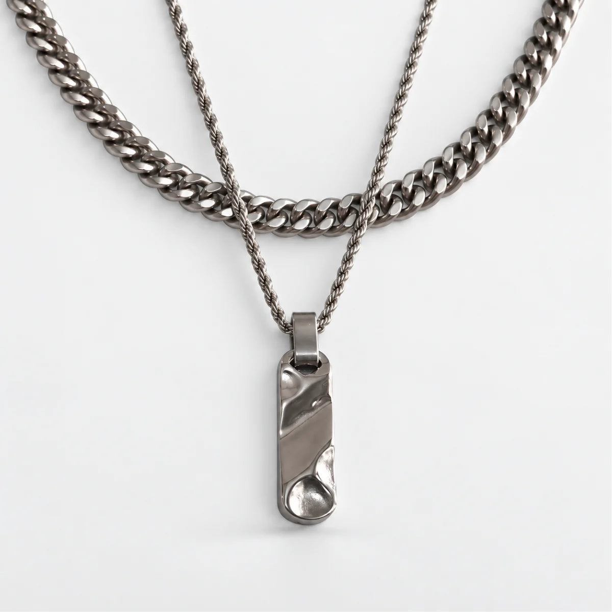 textured bar necklace layered set white background