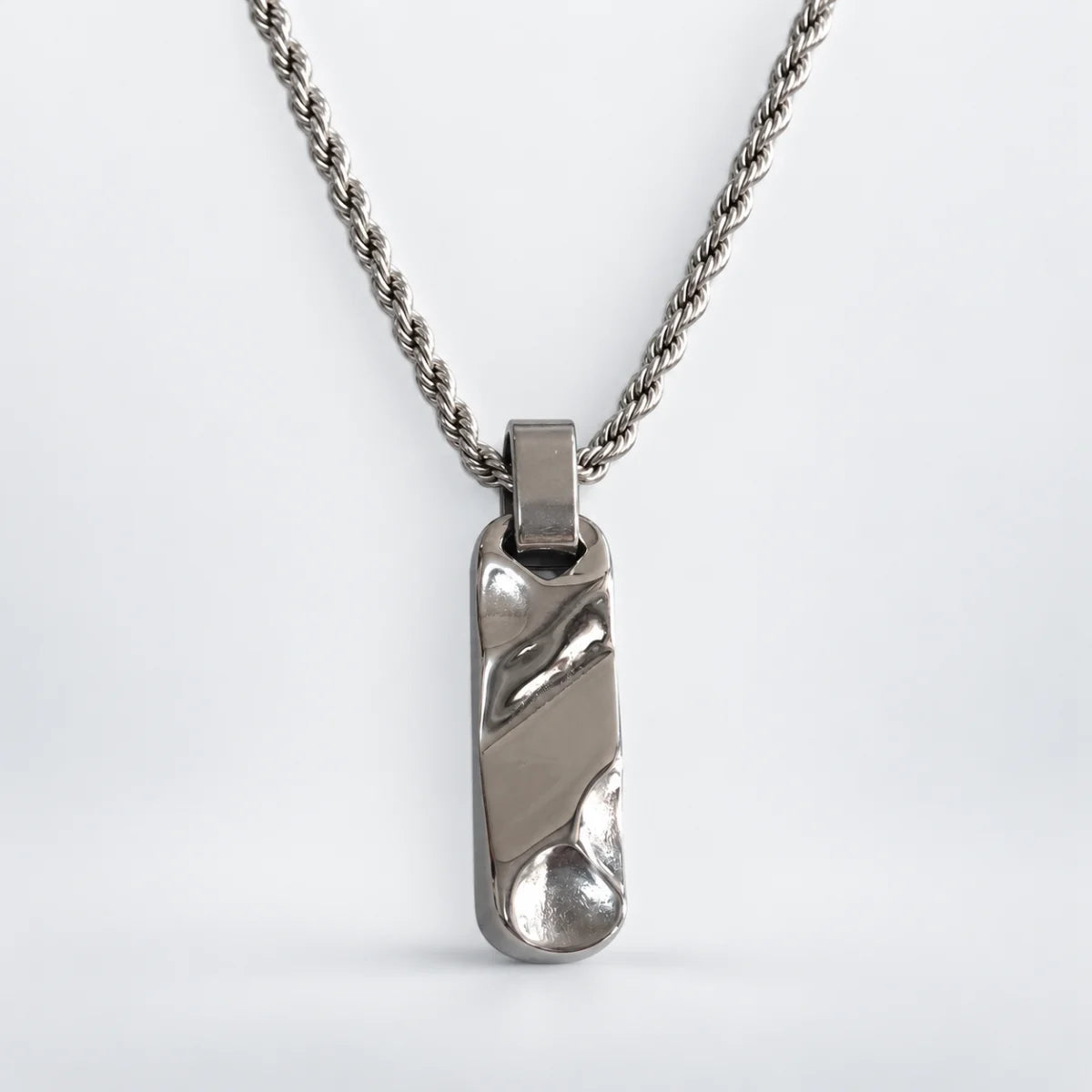 textured bar necklace with rope chain white background