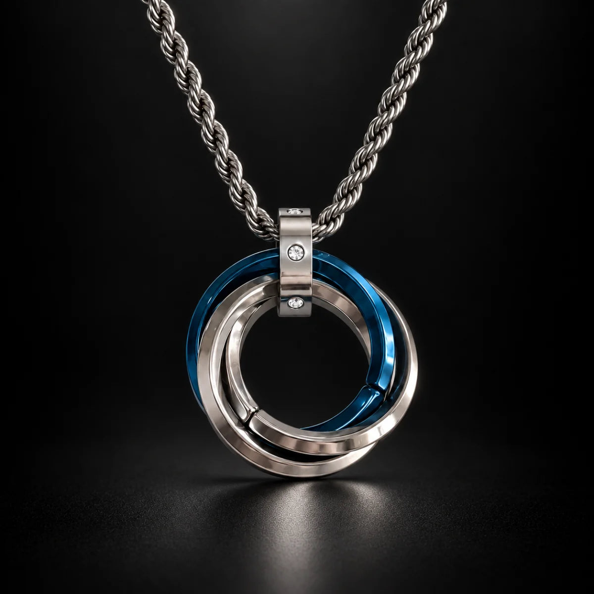 three ring necklace black background hero