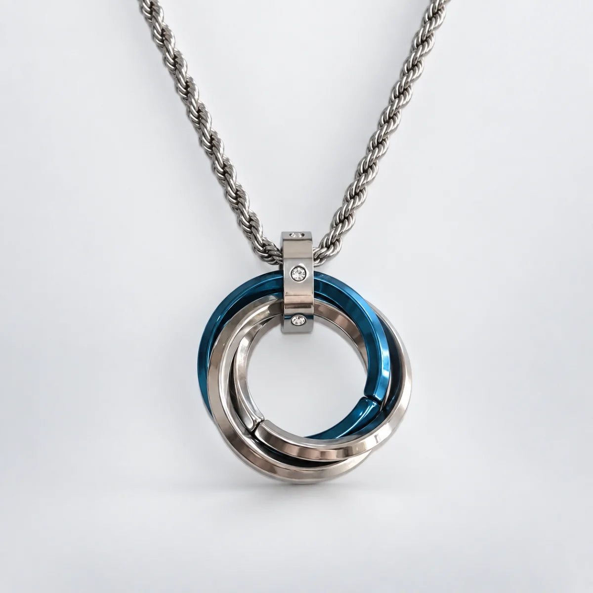 three ring necklace with rope chain white background