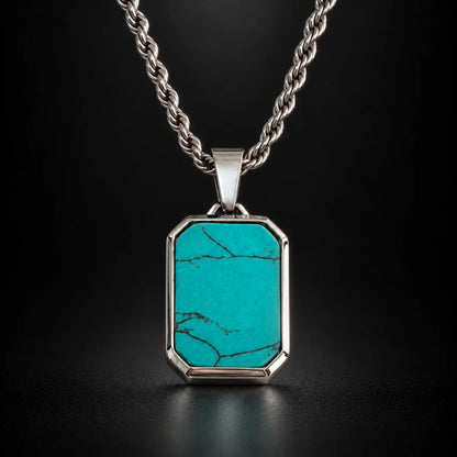 turquoise dog tag necklace black background hero