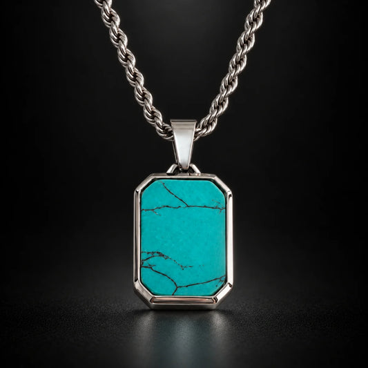 turquoise dog tag necklace black background hero
