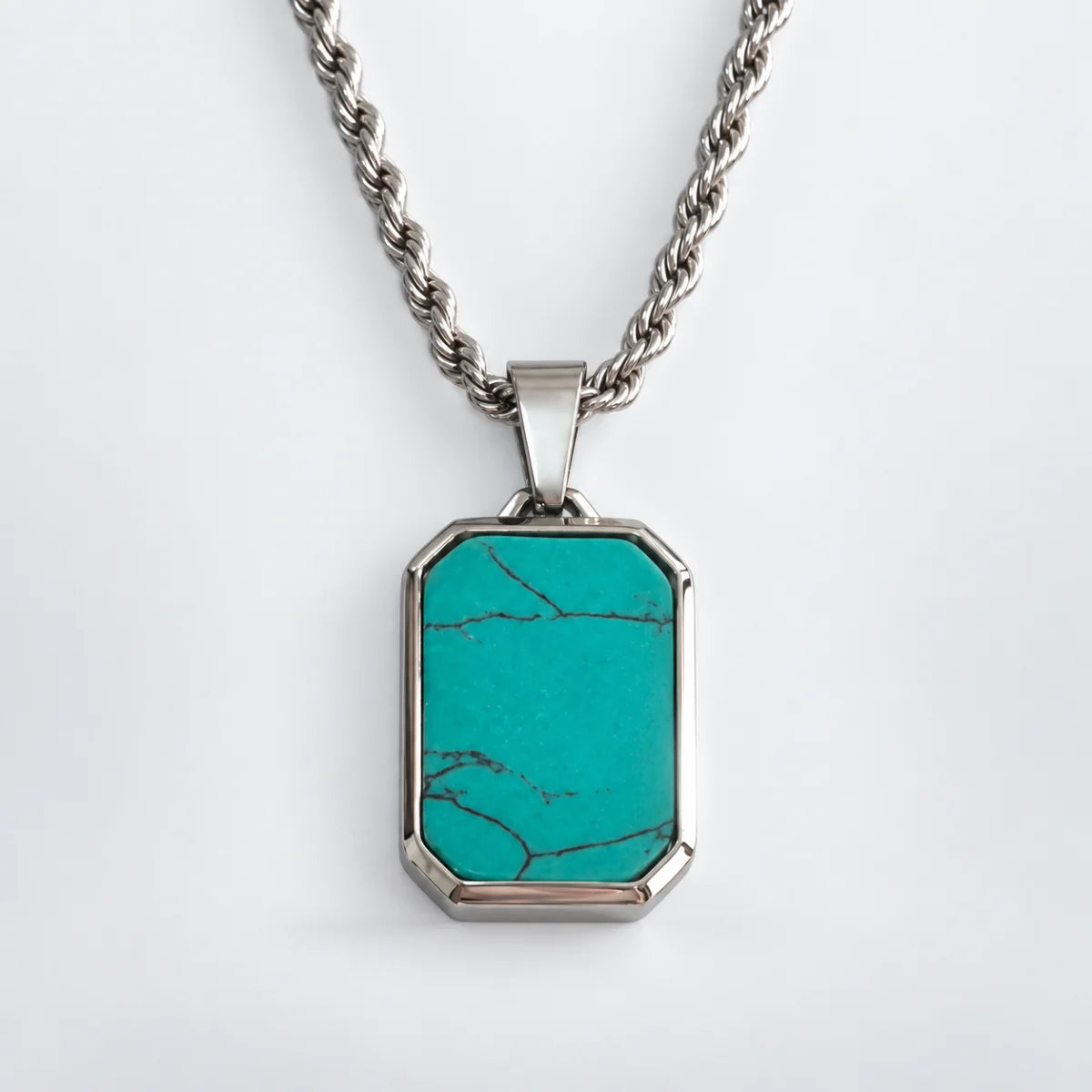 turquoise dog tag necklace with rope chain white background