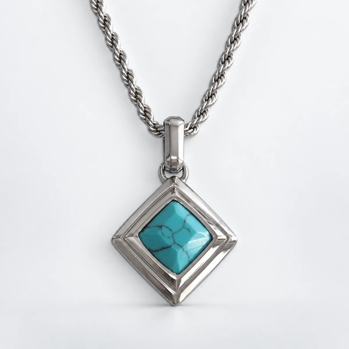turquoise geometric necklace with rope chain white background