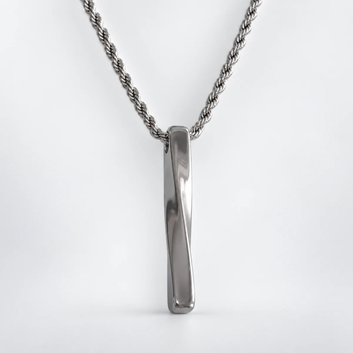 twist bar necklace with rope chain white background
